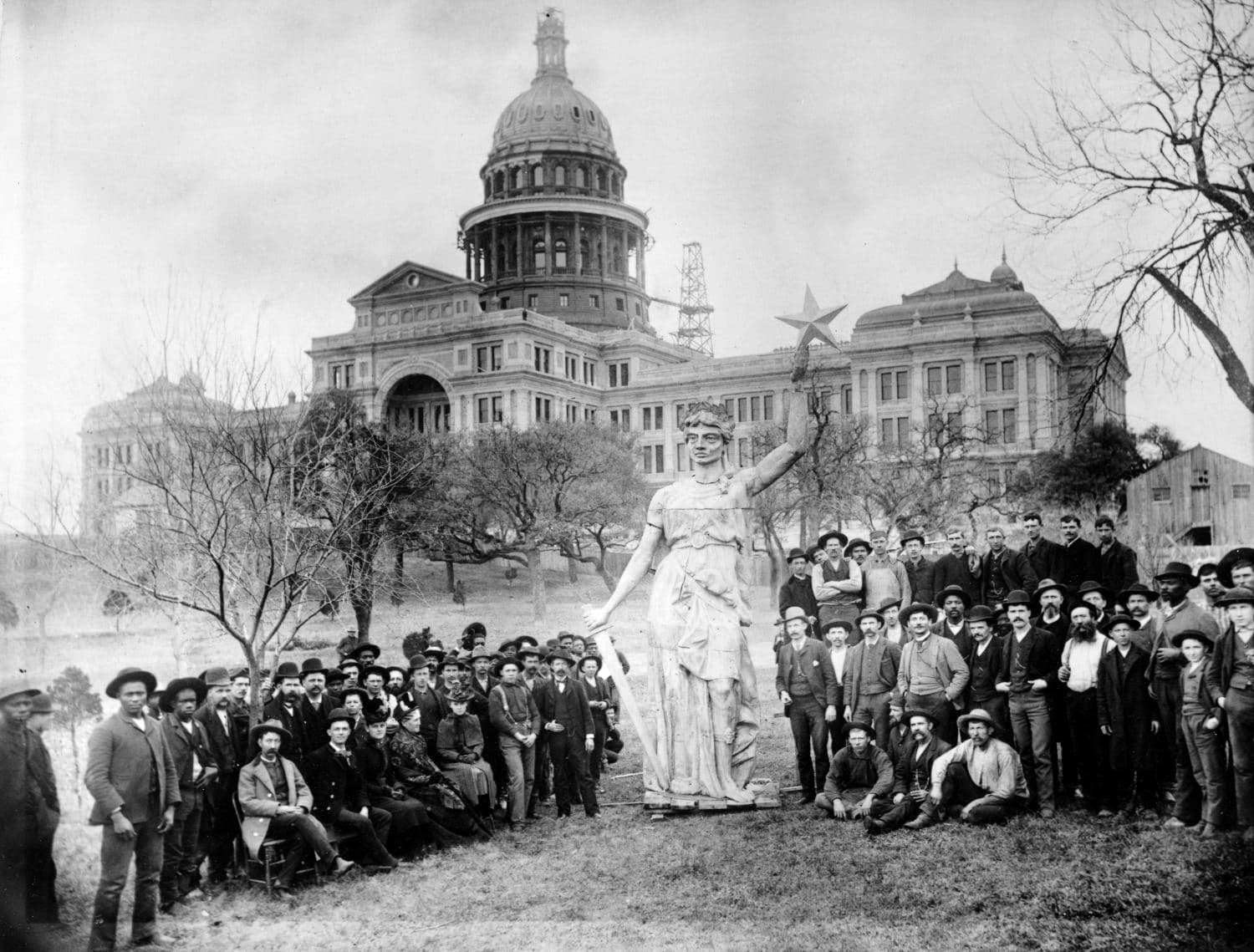 Original February 1888 ground-level photograph of the 8,000-pound zinc Goddess of Liberty assembled in four hollow cast sections on the Capitol south grounds before being hoisted 300 feet to the lantern pinnacle.